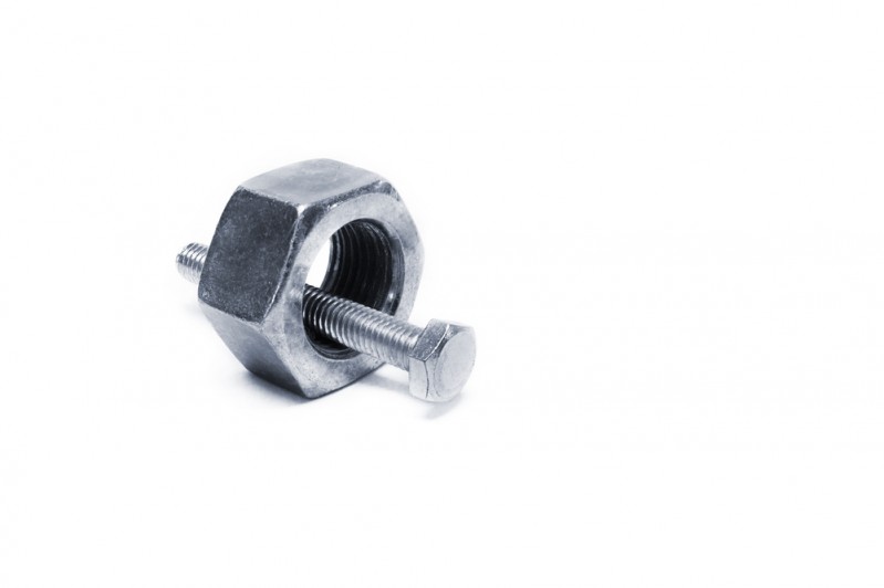 a bolt inside a nut that it too big for it