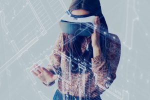 Woman using VR learning to view plans