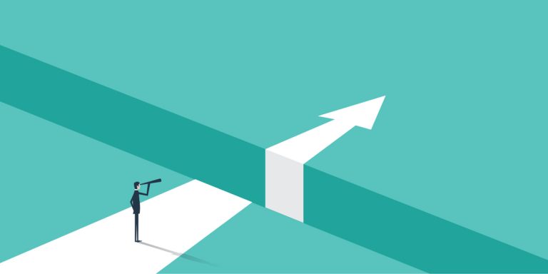 Man looking over a chasm into the future