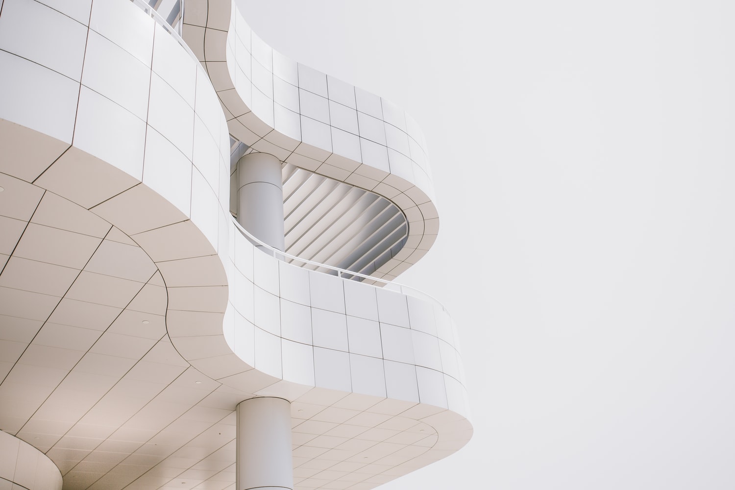 a white curvy shape building